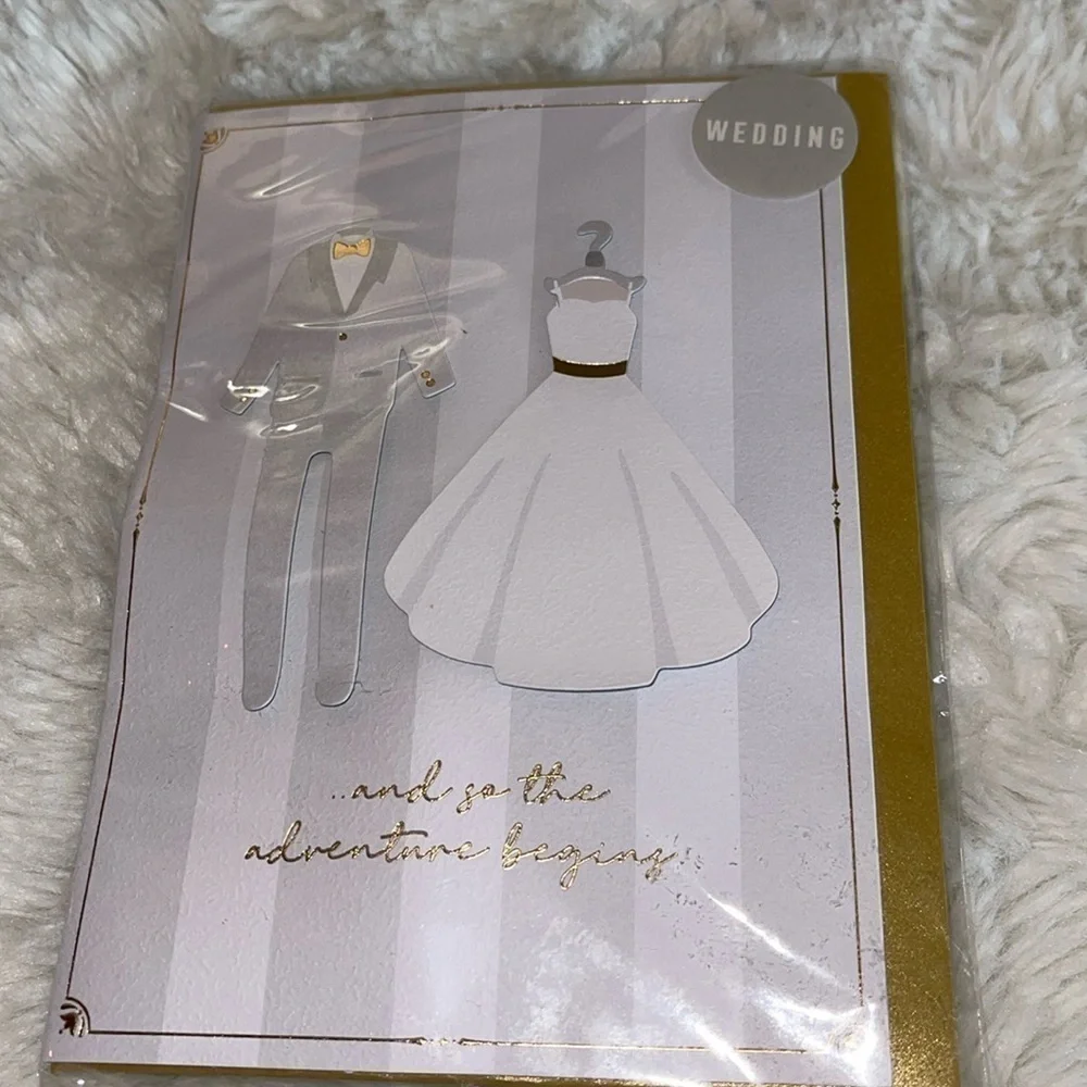 Wedding card only one NWT has a bride and groom outfit in the front stored away